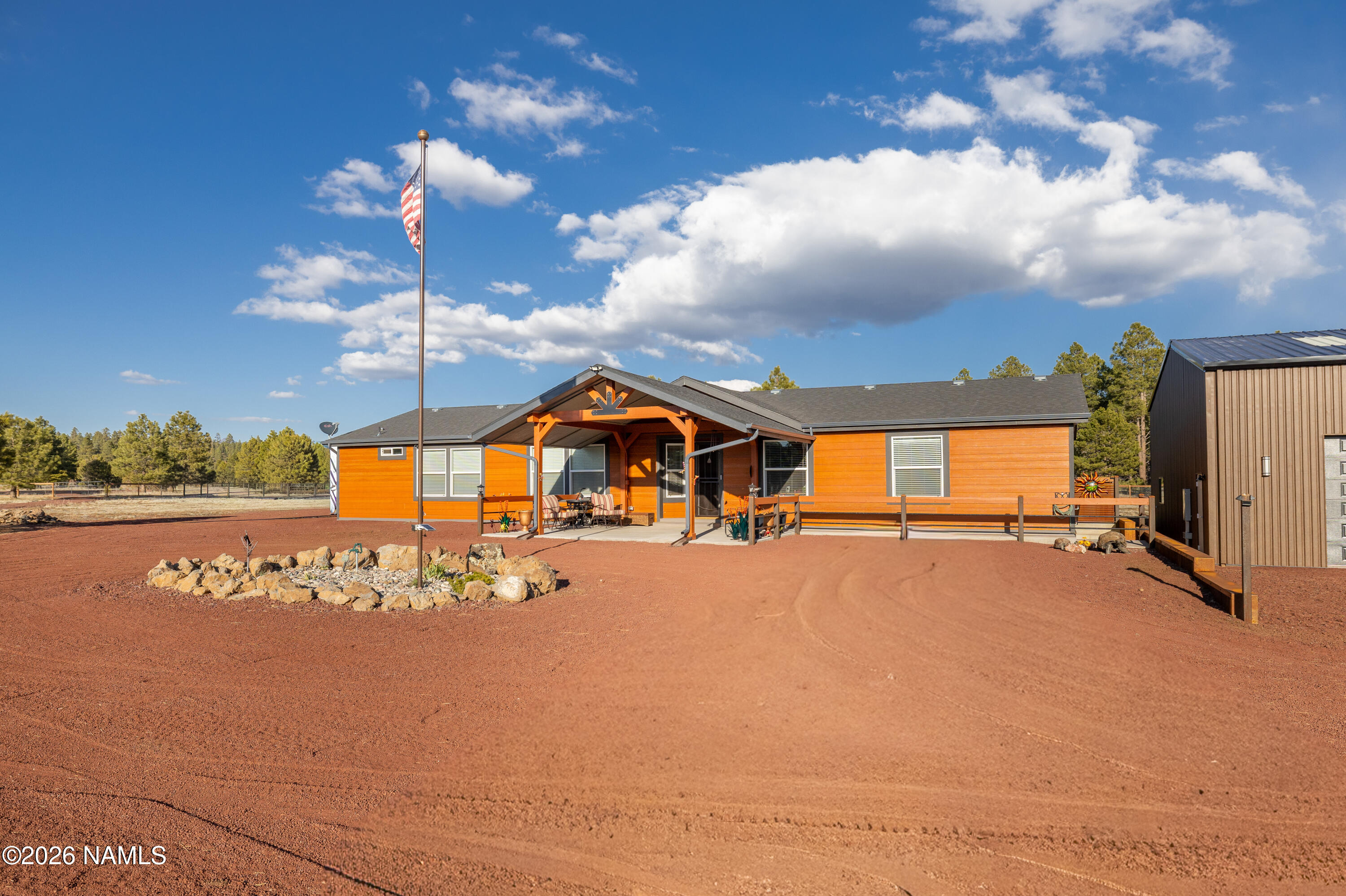 1150 North Three Bears Loop Parks, AZ 86018 - Photo 67 of 82 a view of a house with a yard