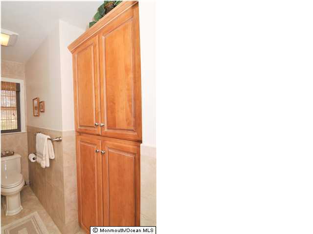 861 Colts Neck Road Freehold, NJ 07728 - Photo 20 of 25 a bathroom with a toilet