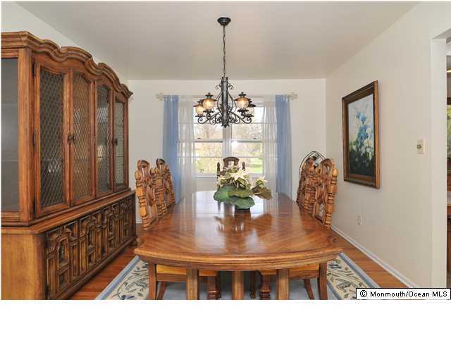 861 Colts Neck Road Freehold, NJ 07728 - Photo 7 of 25 a dining room with furniture and window