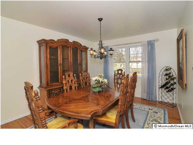 861 Colts Neck Road Freehold, NJ 07728 - Photo 8 of 25 a dining room with furniture and window