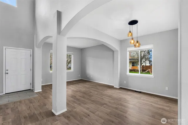 a view of an empty room and window