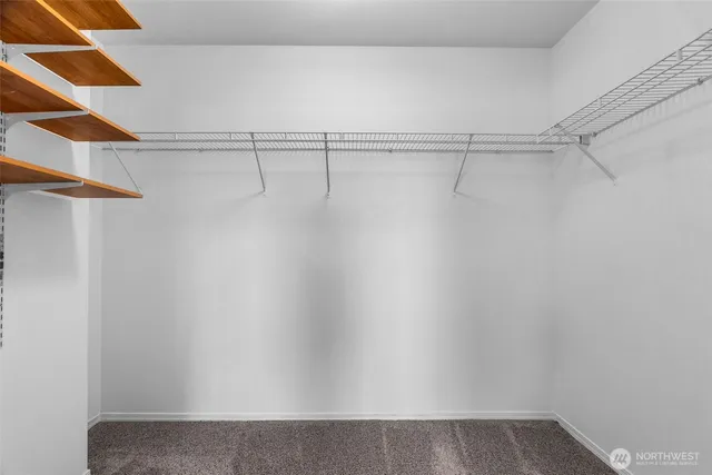 a view of a room with racks on the wall