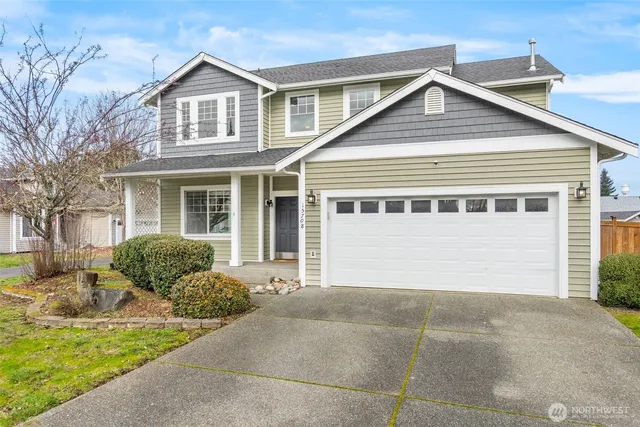 a view of a house with a door and a window