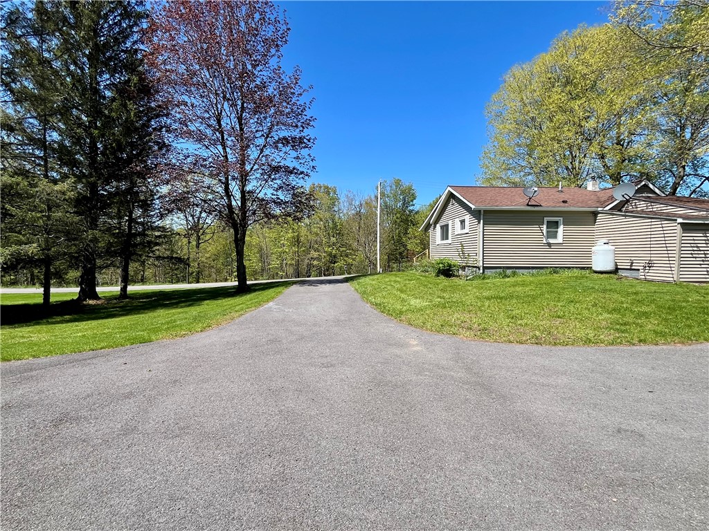 558 Sterling Station Road Sterling, NY 13143 - Photo 14 of 45 Ample parking with the recent paved driveway
