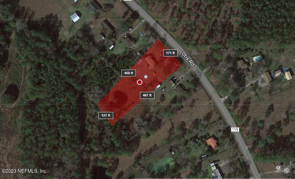 1370 Otis Road Jacksonville, FL 32220 - Photo 2 of 17 a view of a house with a yard