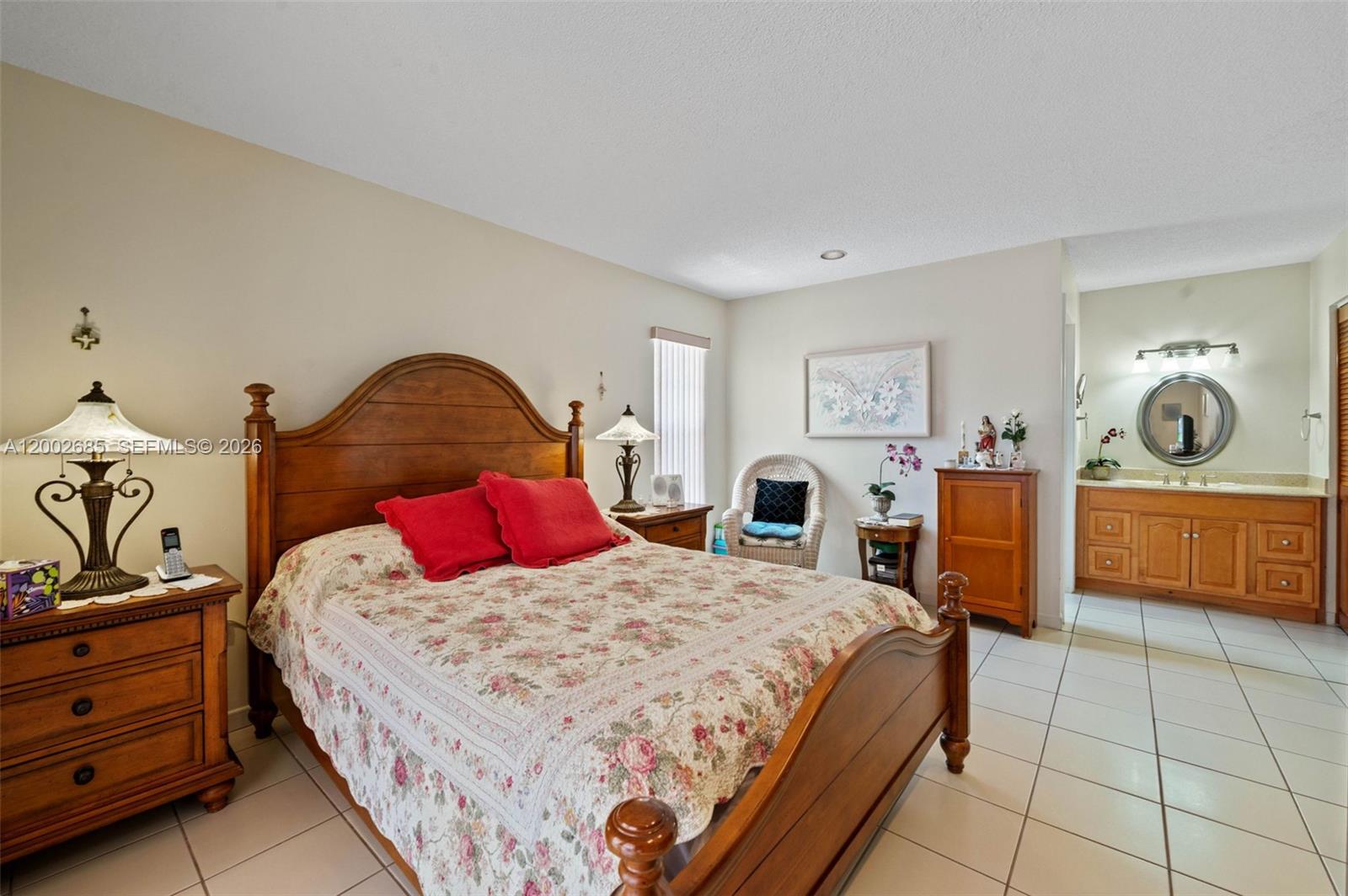13440 Southwest 28th Street Miami, FL 33175 - Photo 14 of 35 a bedroom with a bed and a dresser