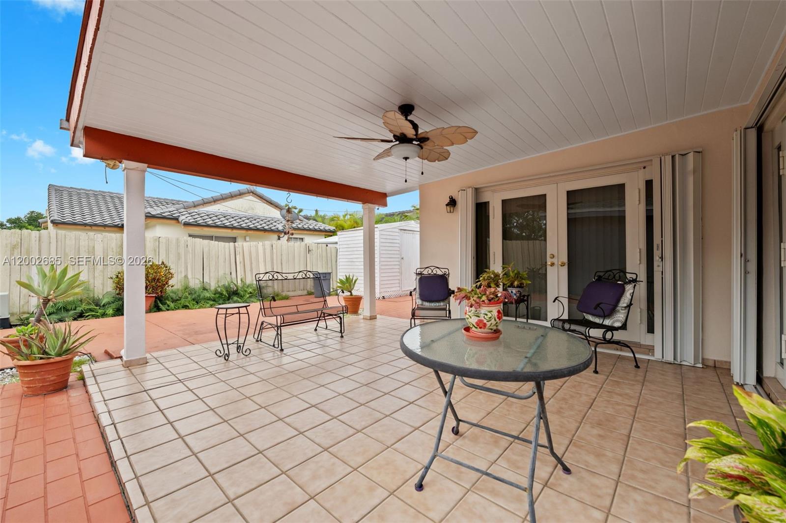 13440 Southwest 28th Street Miami, FL 33175 - Photo 21 of 35 a living room with patio furniture