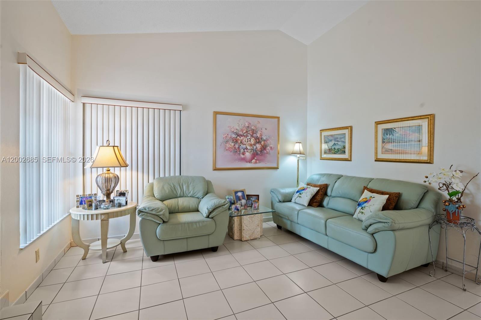 13440 Southwest 28th Street Miami, FL 33175 - Photo 3 of 35 a living room with furniture and a couch