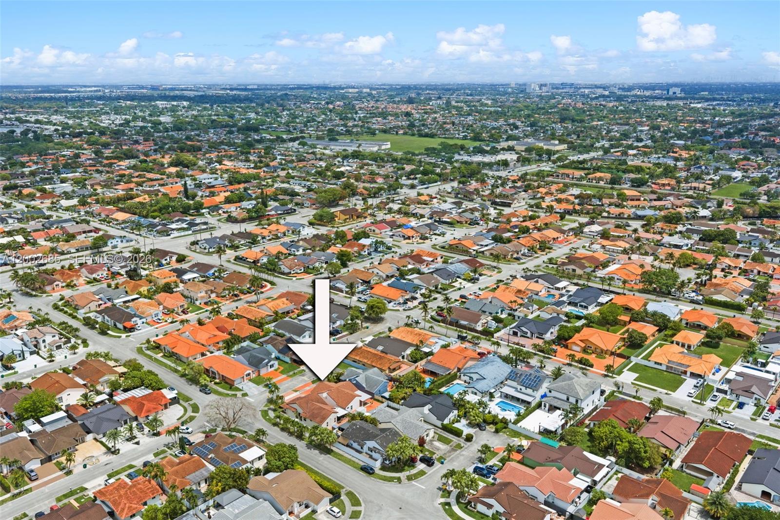 13440 Southwest 28th Street Miami, FL 33175 - Photo 31 of 35 an aerial view of a houses with a yard