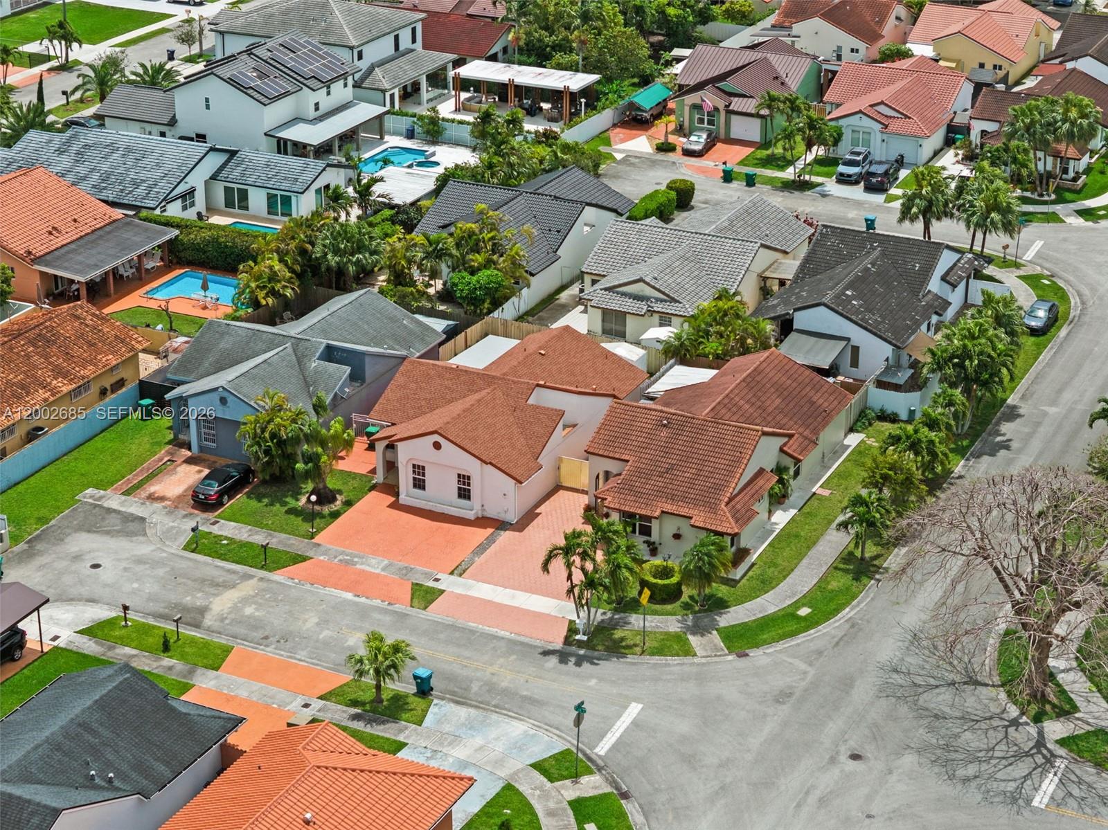 13440 Southwest 28th Street Miami, FL 33175 - Photo 34 of 35 an aerial view of residential houses with outdoor space