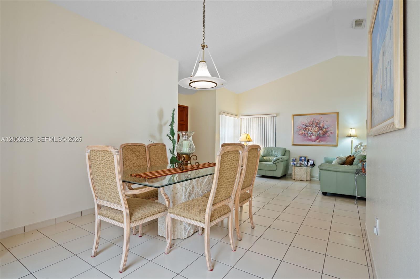 13440 Southwest 28th Street Miami, FL 33175 - Photo 4 of 35 a dining room with furniture and window