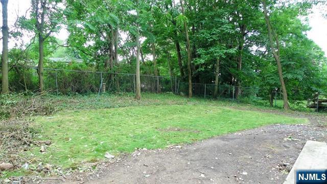 48 Rock Road Englewood Cliffs, NJ 07632 - Photo 22 of 23 a view of outdoor space with deck and yard