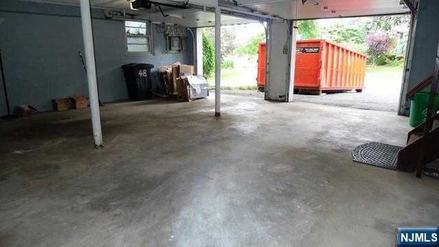 48 Rock Road Englewood Cliffs, NJ 07632 - Photo 23 of 23 a view of a livingroom with furniture and a gate