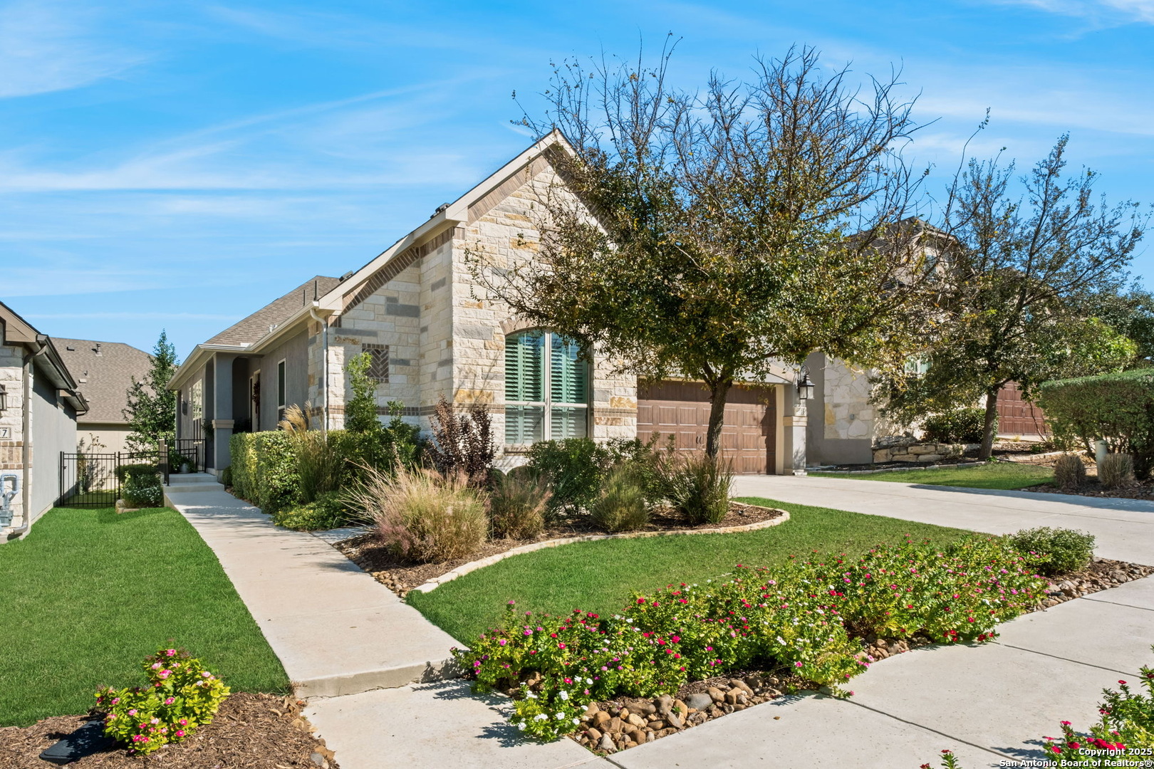 105 Gaucho Boerne, TX 78006 - Photo 2 of 29 a front view of a house with garden