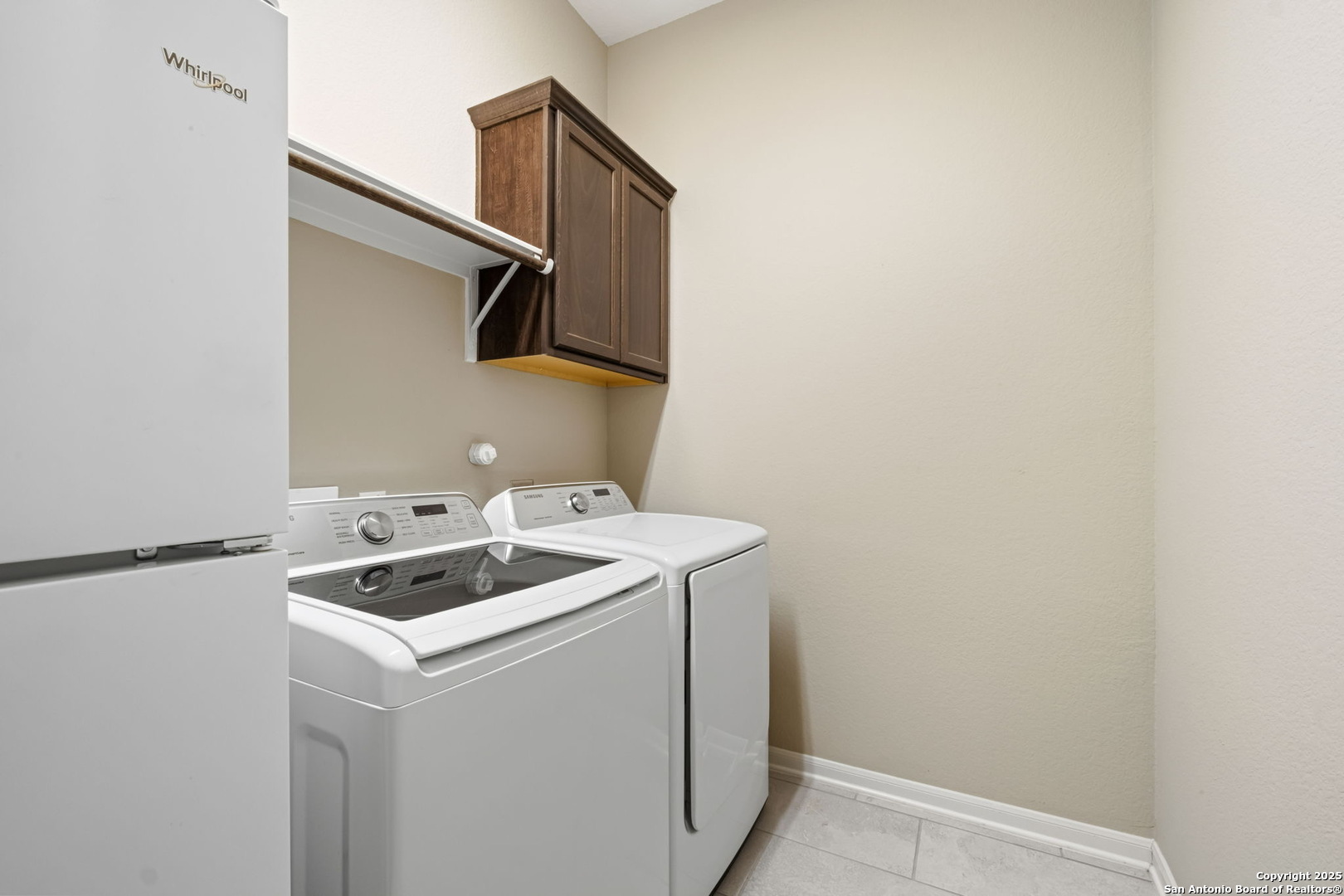 105 Gaucho Boerne, TX 78006 - Photo 25 of 29 a utility room with dryer and washer