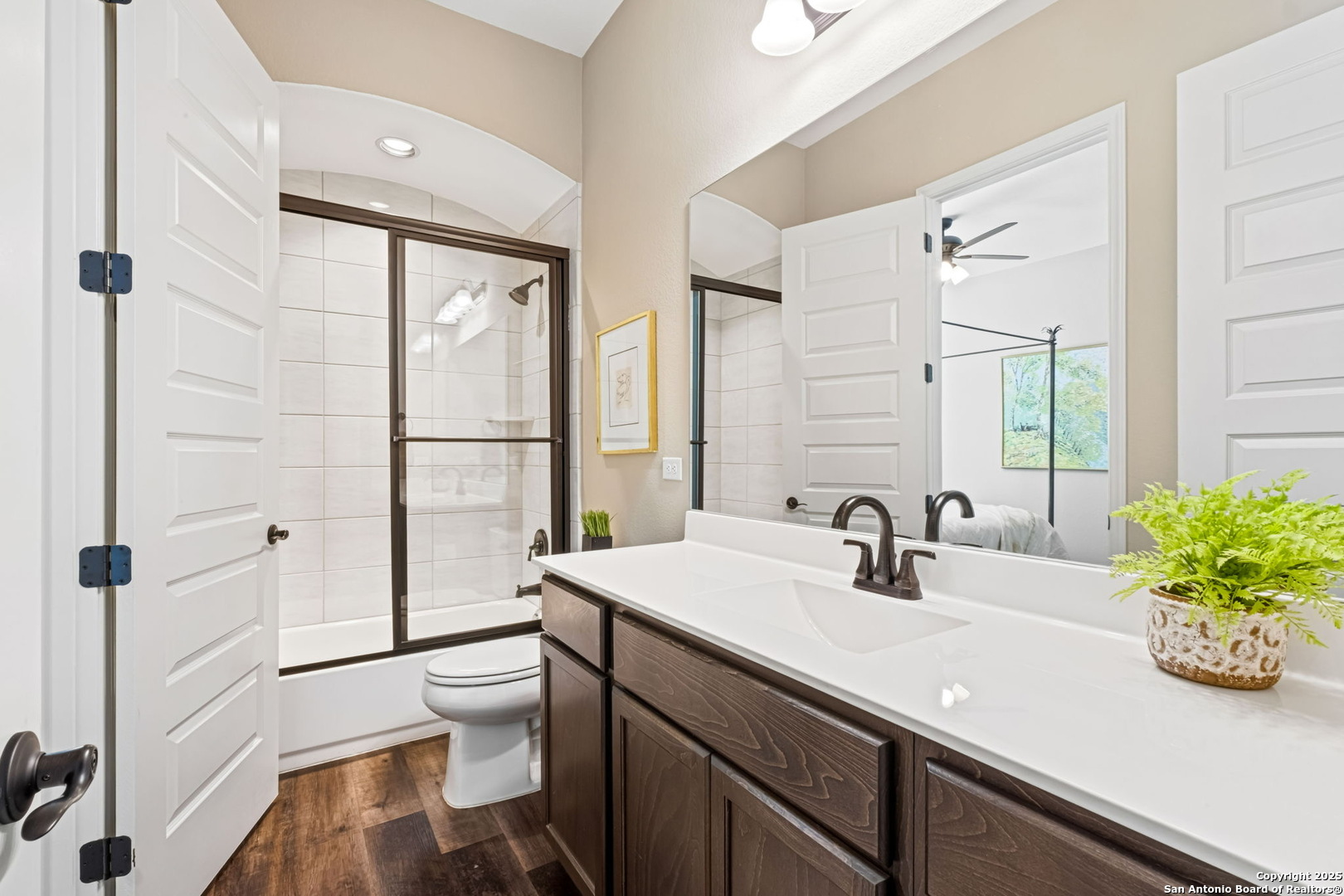 105 Gaucho Boerne, TX 78006 - Photo 27 of 29 a bathroom with a sink a toilet and shower