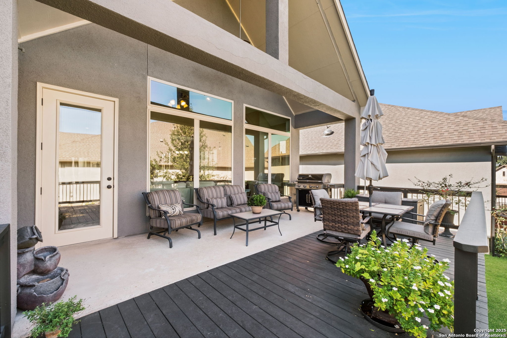 105 Gaucho Boerne, TX 78006 - Photo 9 of 29 a living room with patio furniture and a large window