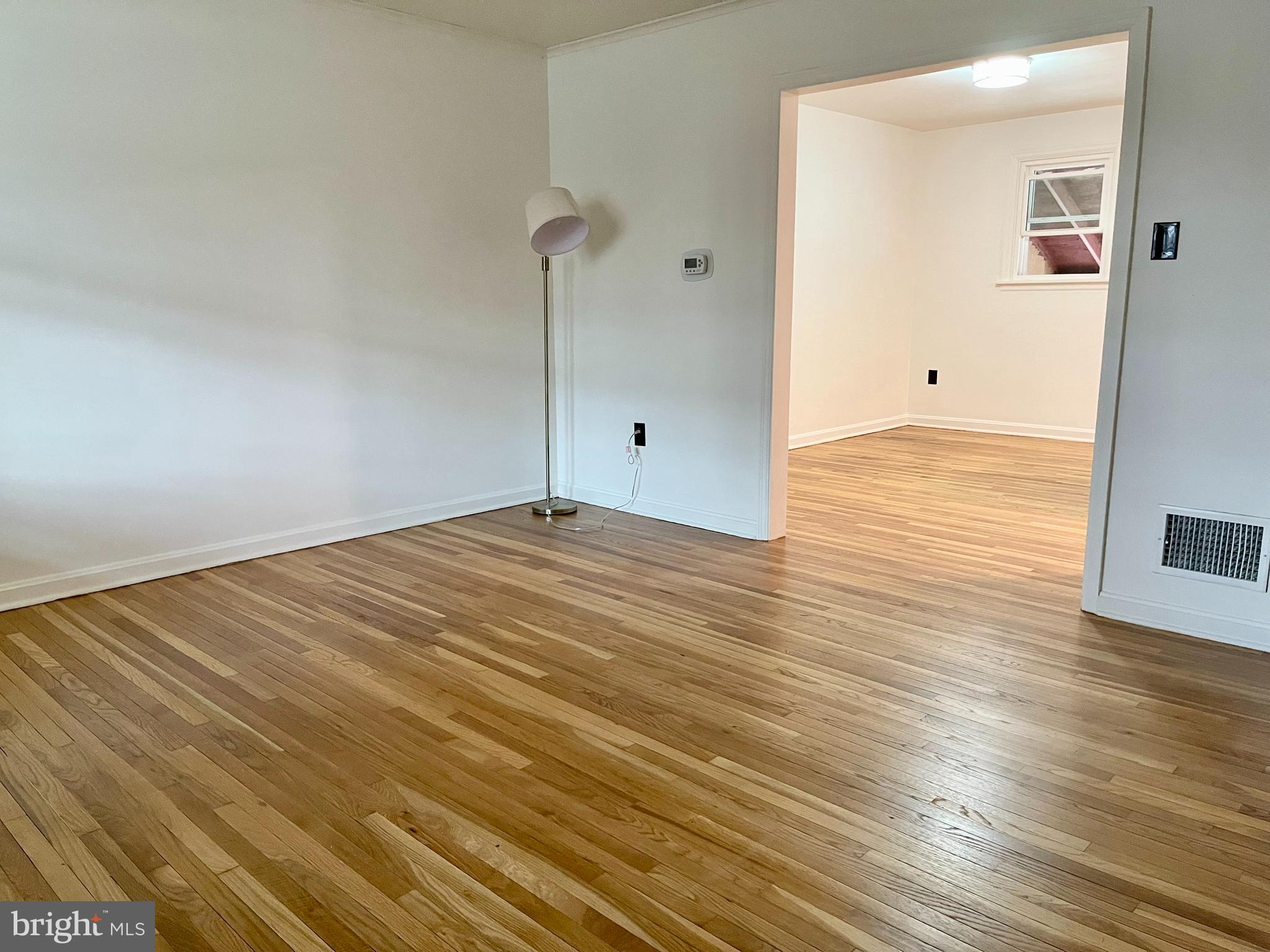 1136 Union Street Lancaster, PA 17603 - Photo 11 of 24 a view of an empty room with wooden floor