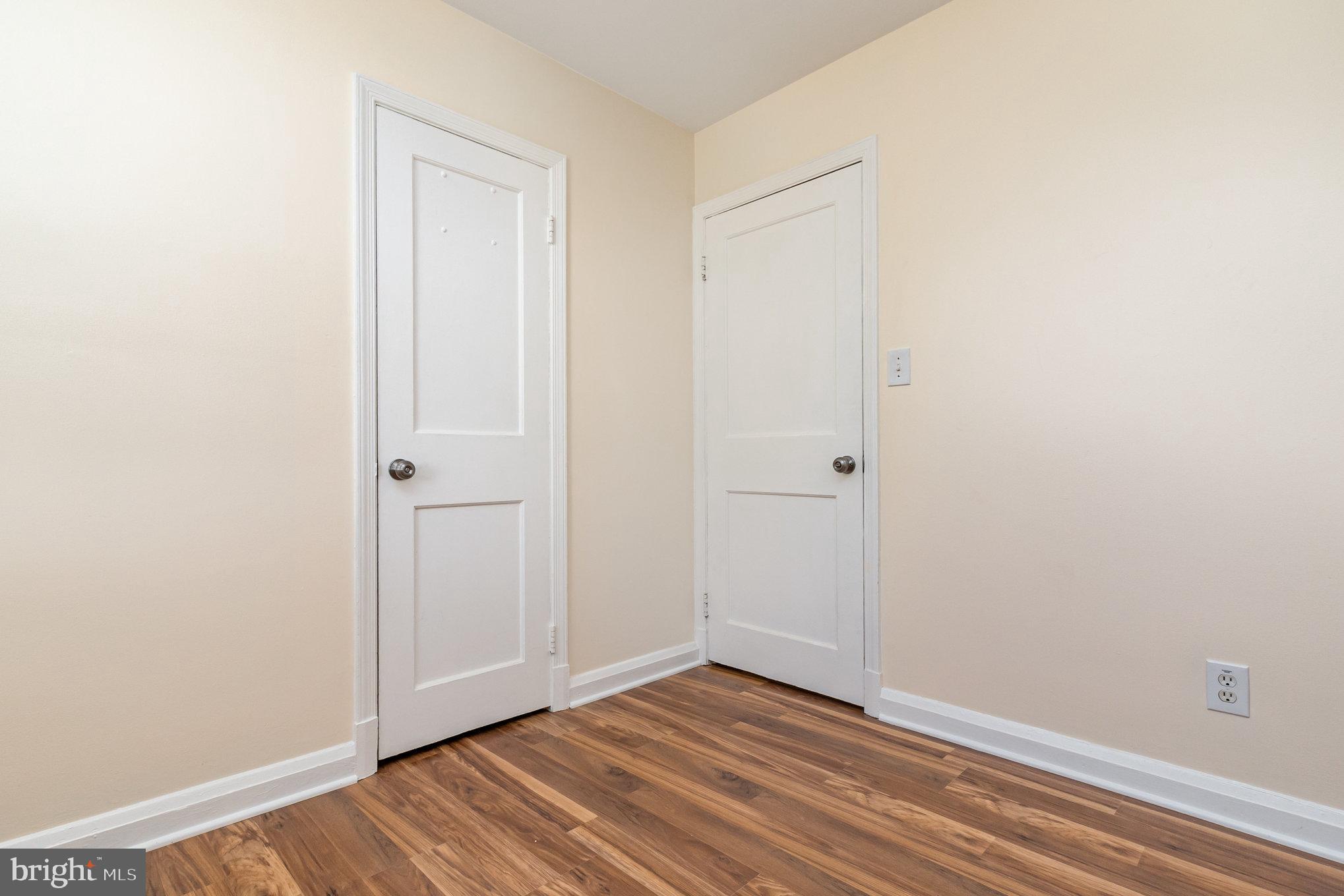 6301 Fieldvale Road Baltimore, MD 21237 - Photo 16 of 44 a view of an empty room with wooden floor