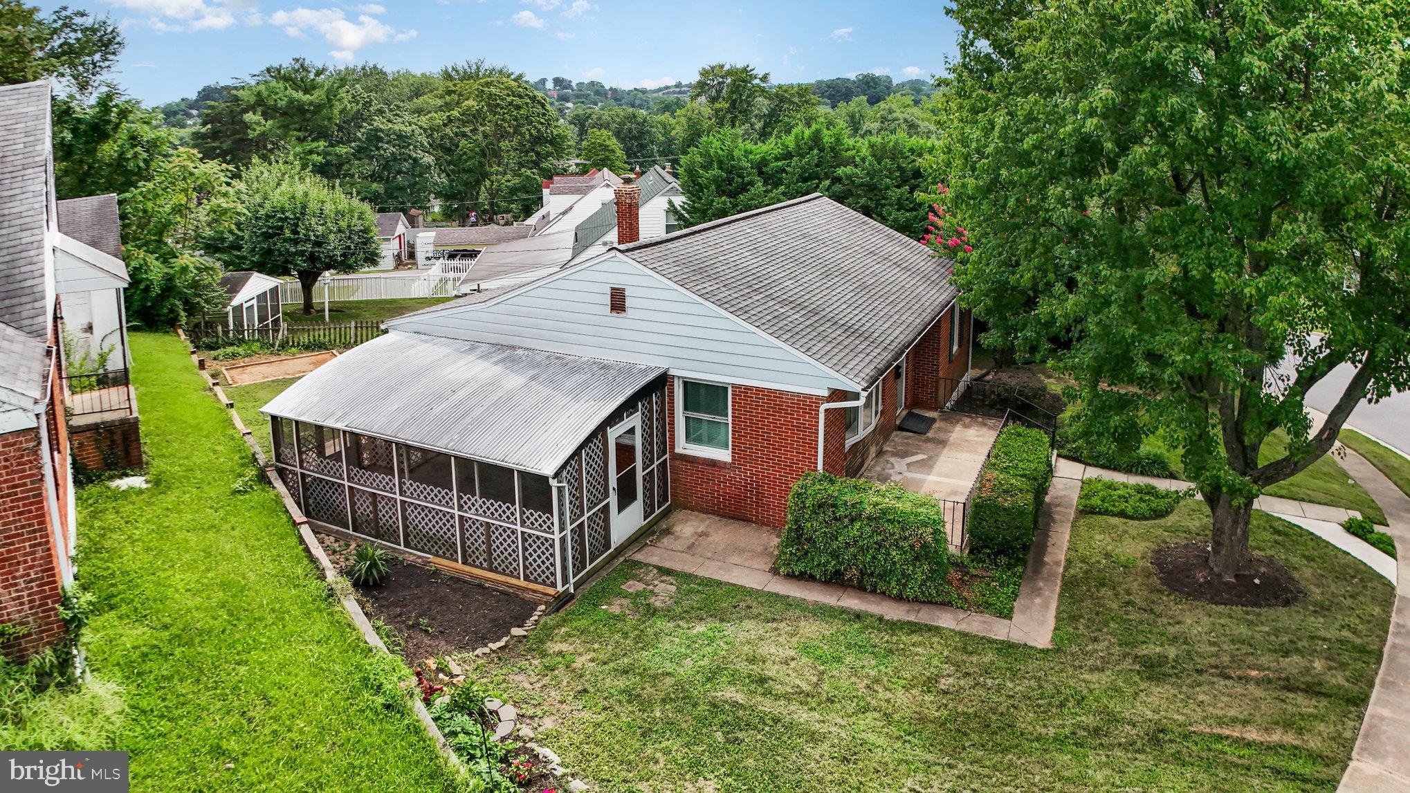 6301 Fieldvale Road Baltimore, MD 21237 - Photo 38 of 44 a view of a house with backyard and fence