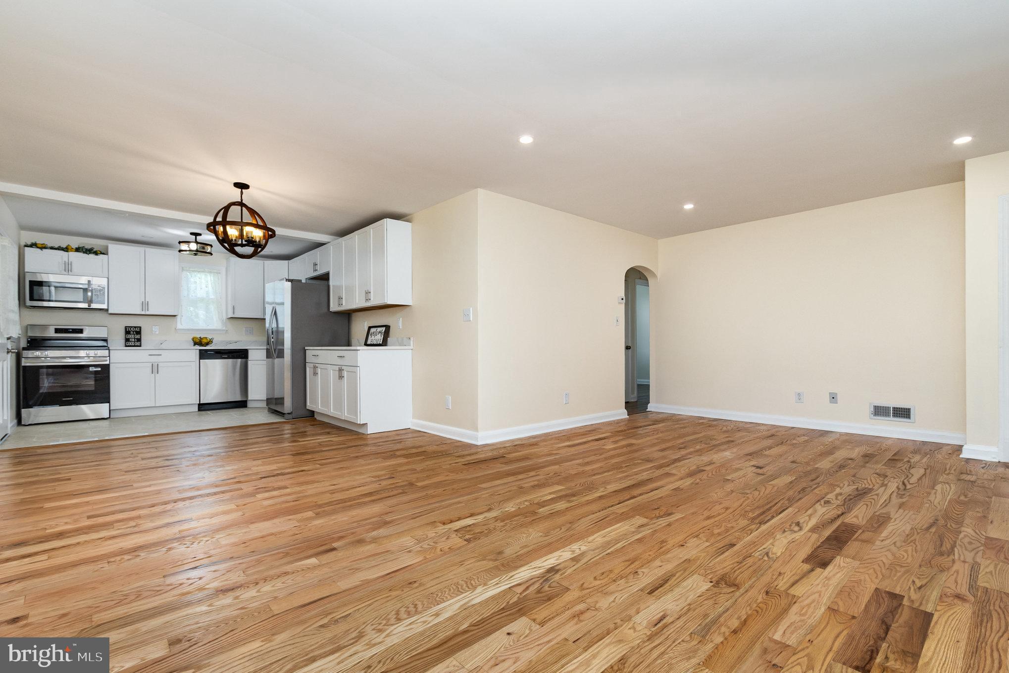 6301 Fieldvale Road Baltimore, MD 21237 - Photo 42 of 44 a view of a kitchen with a sink and a refrigerator