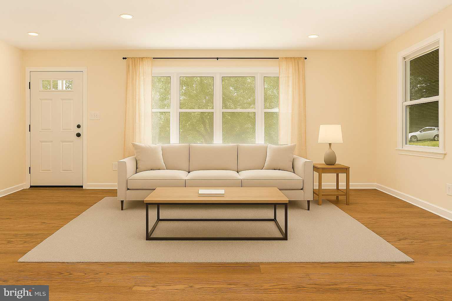 6301 Fieldvale Road Baltimore, MD 21237 - Photo 7 of 44 a living room with furniture and a window
