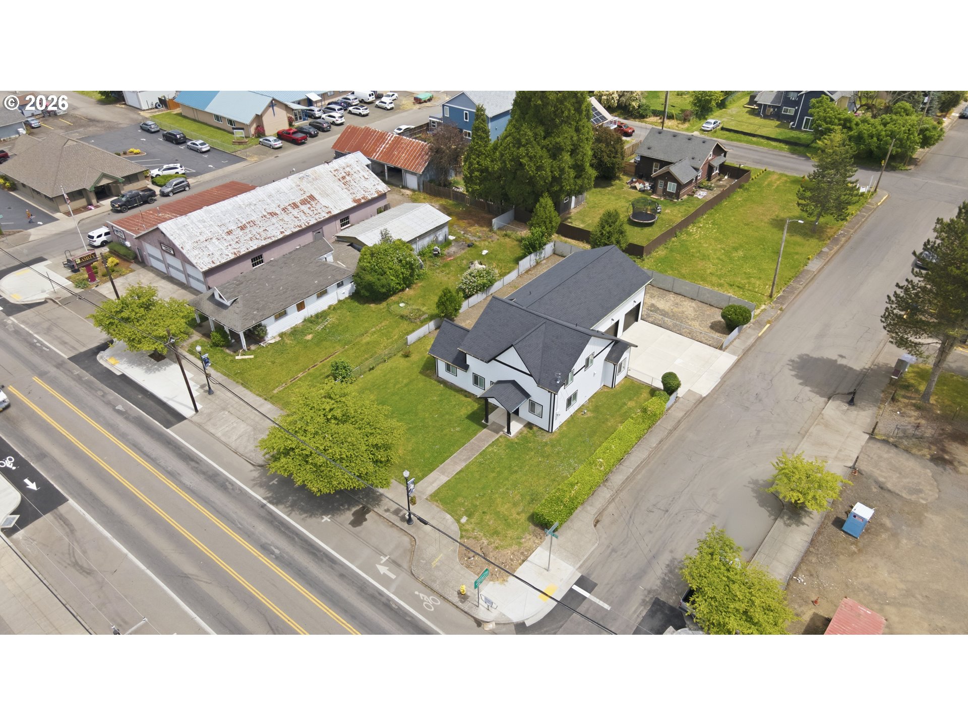 413 South Trade Street Amity, OR 97101 - Photo 34 of 42 an aerial view of a house with a garden