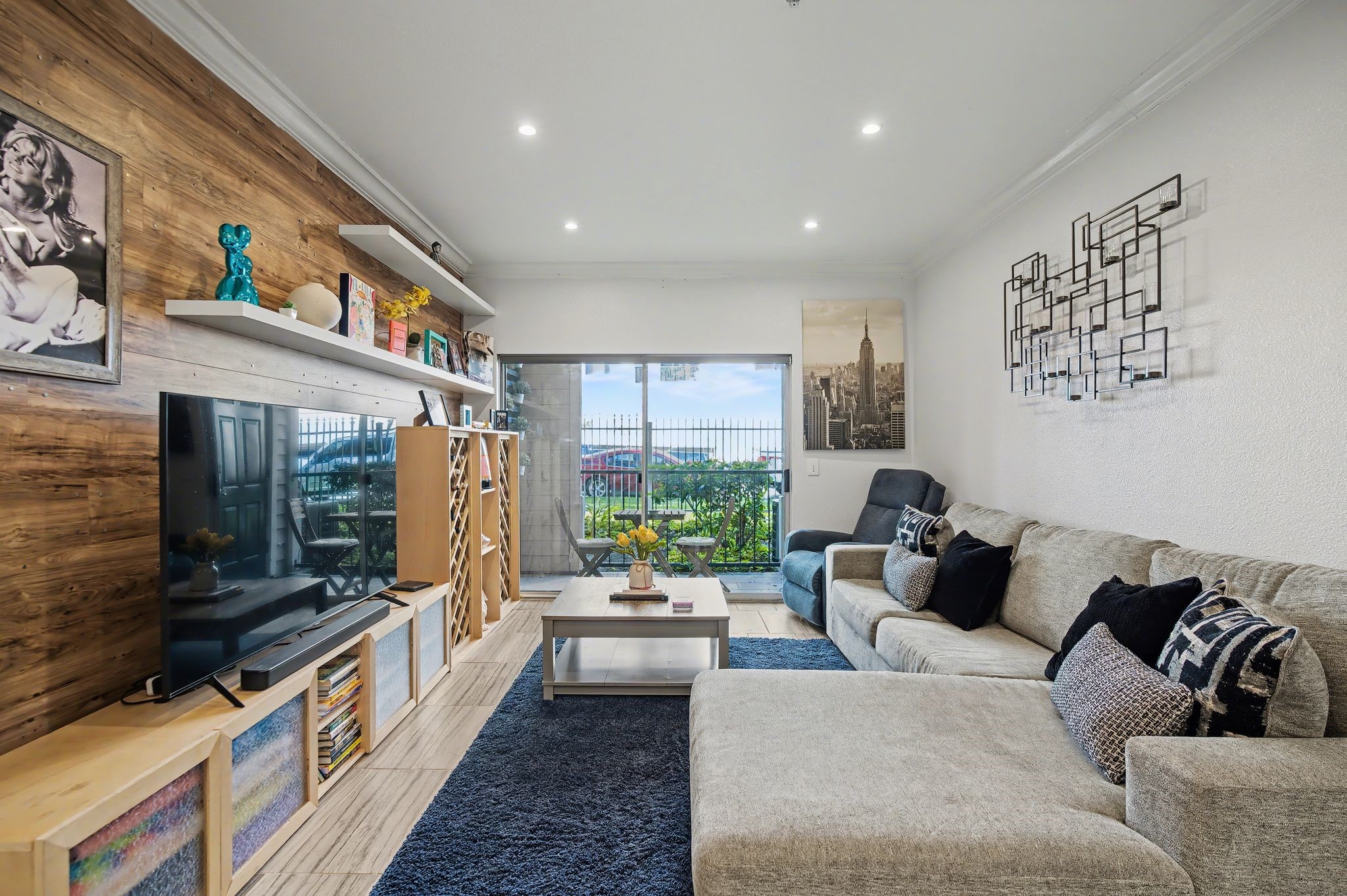 Thoughtfully updated, this standout unit features a custom built-in media cabinet with elegant wine and spirits storage.