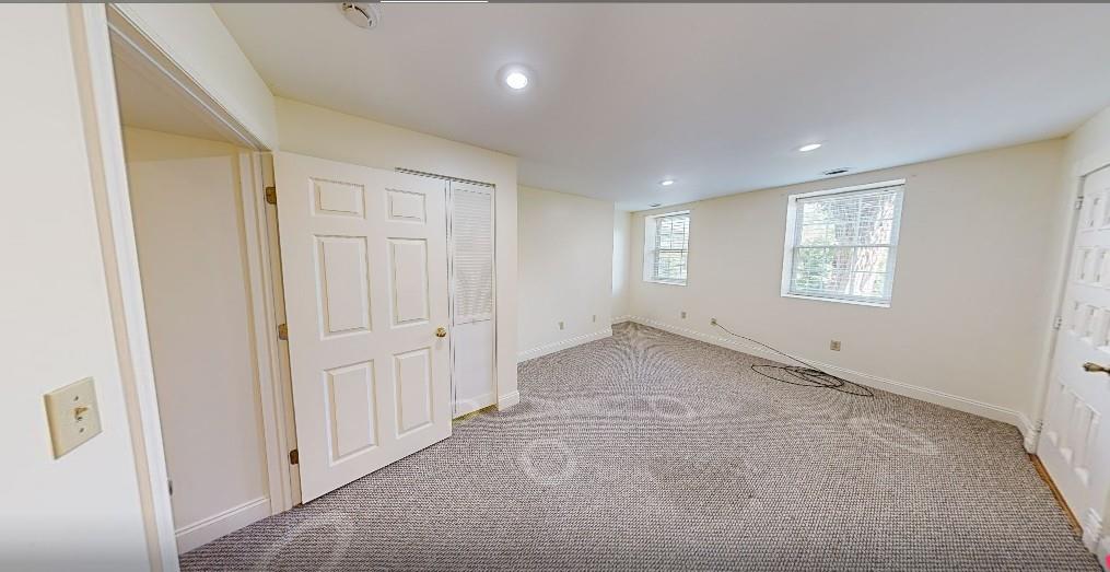 1319 Riverside Drive, Unit 100 Beaver, PA 15009 - Photo 11 of 25 an empty room with windows