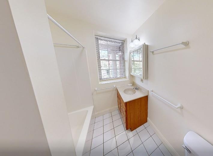 1319 Riverside Drive, Unit 100 Beaver, PA 15009 - Photo 8 of 25 a room with washing machine and window