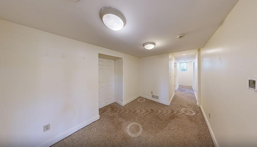 1319 Riverside Drive, Unit 100 Beaver, PA 15009 - Photo 9 of 25 an empty room with windows