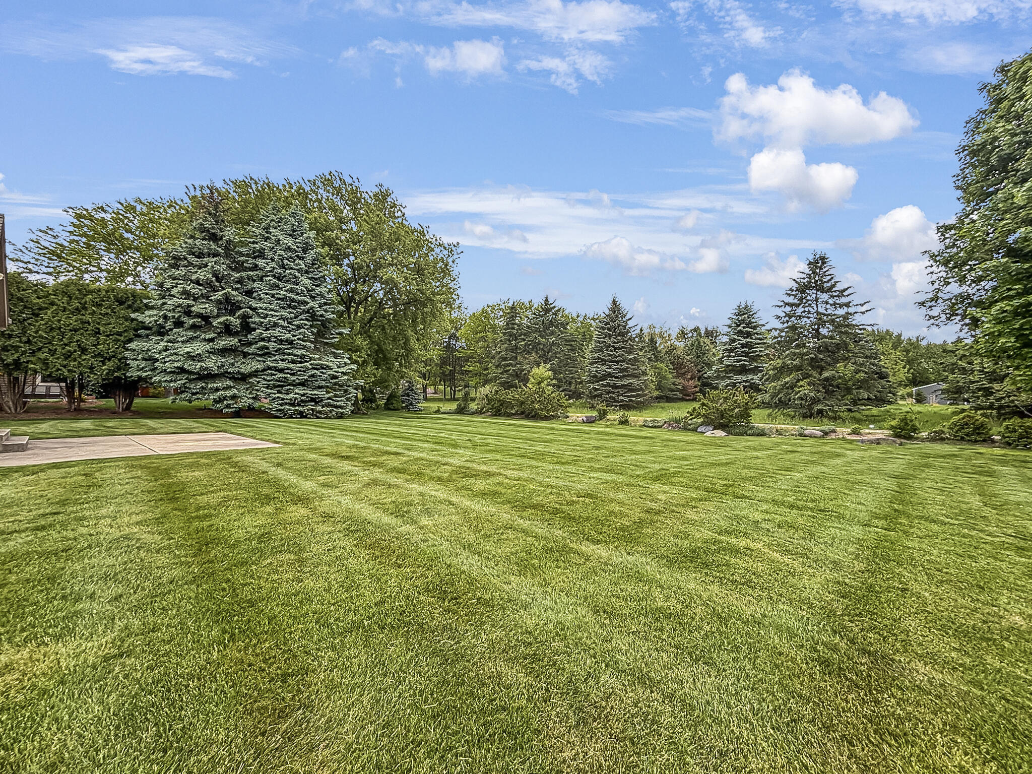 N22W26746 Shooting Star Road Pewaukee, WI 53072 - Photo 35 of 38 Large Backyard