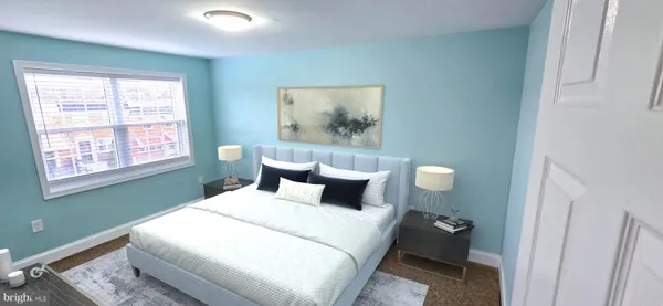 a bedroom with a bed and furniture