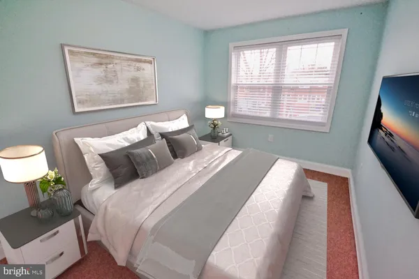 a bathroom with a sink and a window