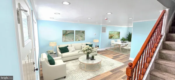 a living room with furniture and a table