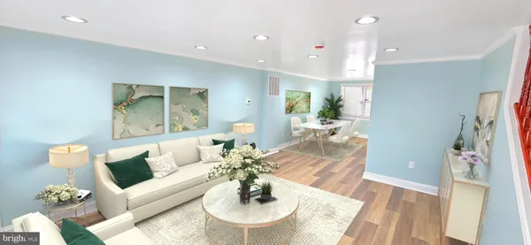 a living room with furniture and a table