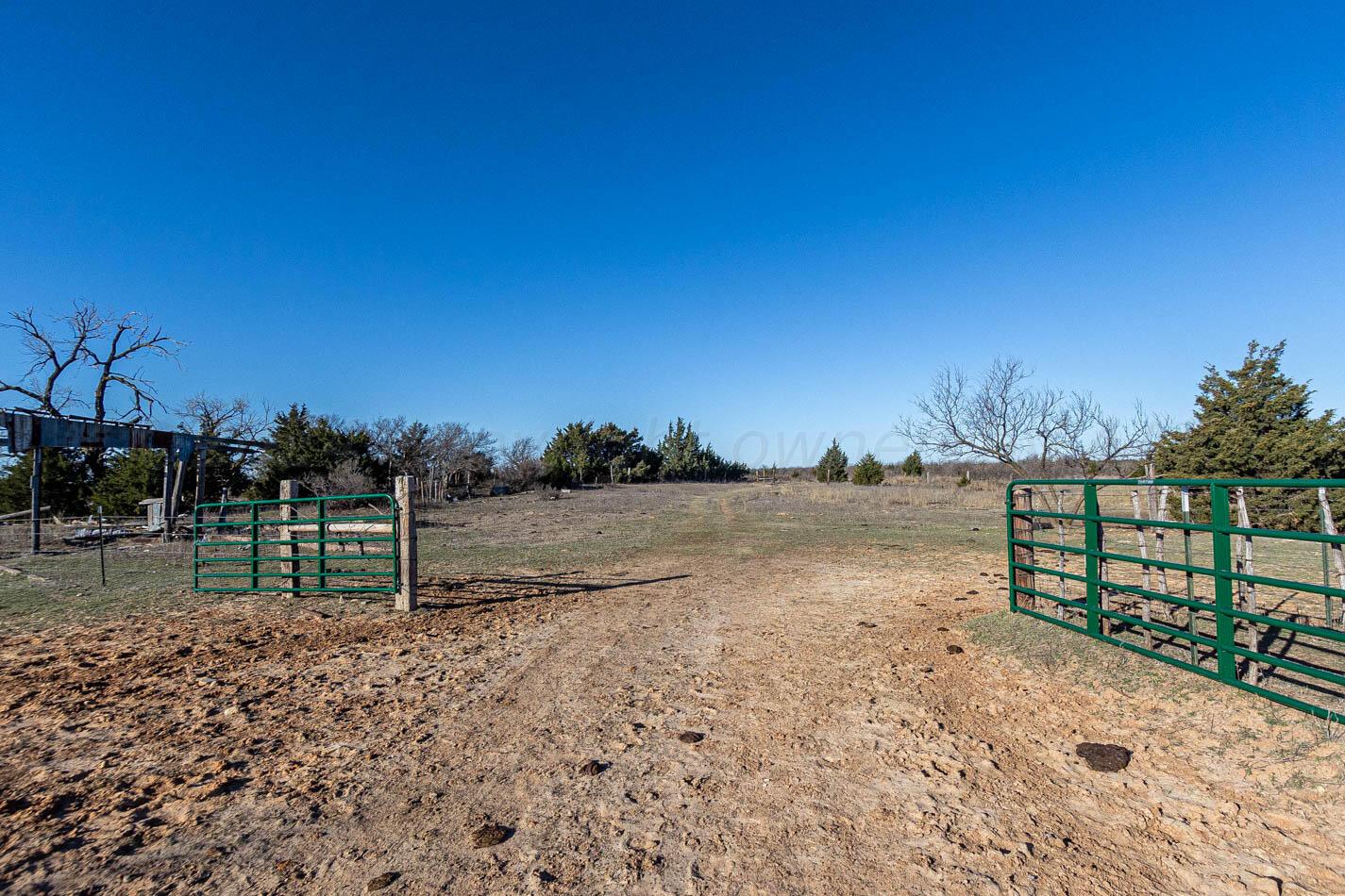 6643 Co Rd 7 Shamrock, TX 79079 - Photo 11 of 55 a view of lake with tree