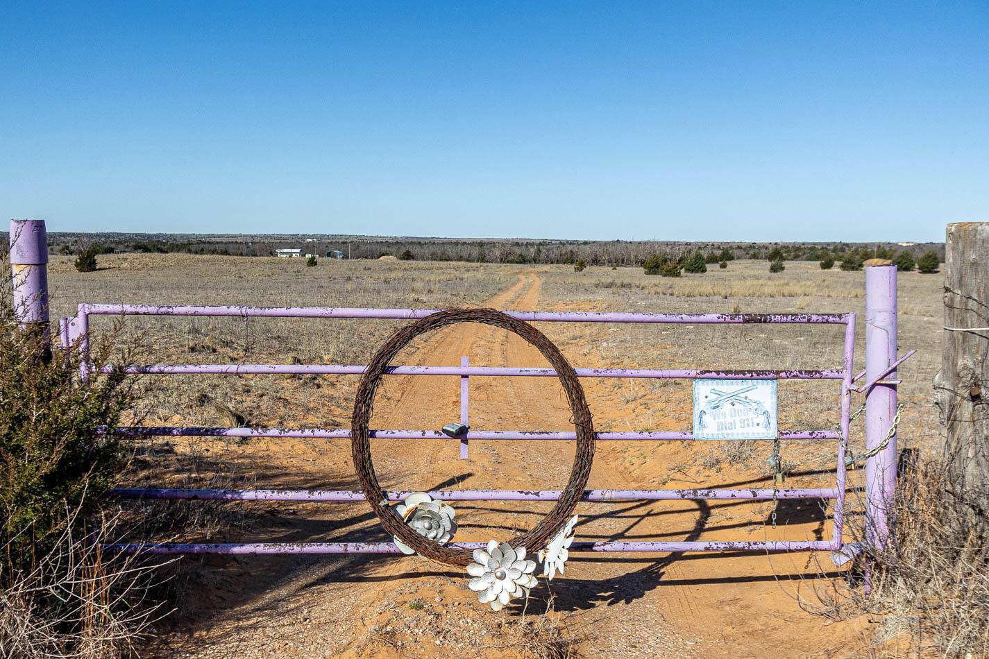 6643 Co Rd 7 Shamrock, TX 79079 - Photo 39 of 55 a view of swimming pool with a floor to ceiling window and outdoor space
