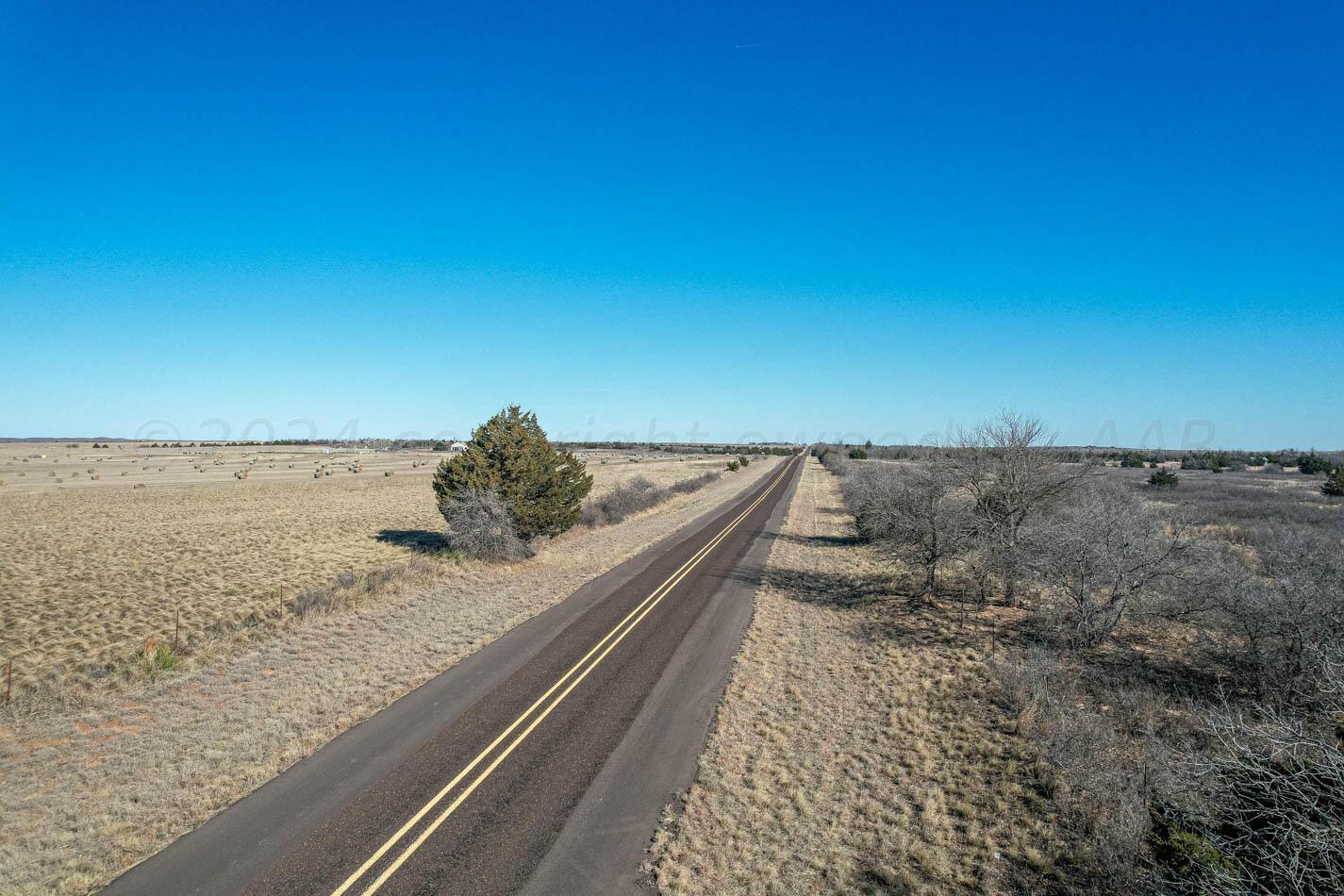 6643 Co Rd 7 Shamrock, TX 79079 - Photo 43 of 55 a view of roof and window