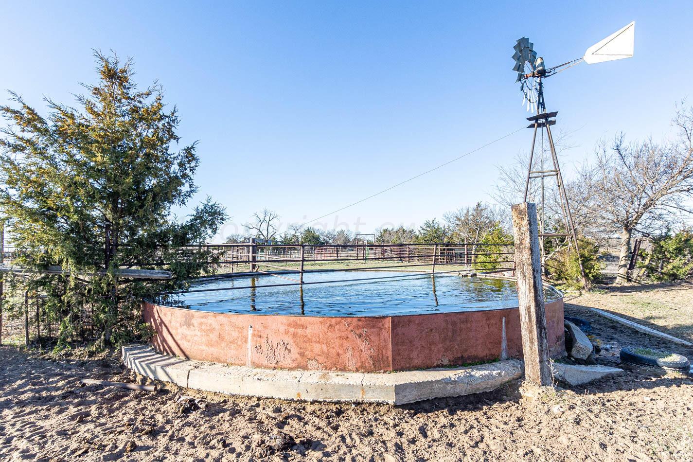 6643 Co Rd 7 Shamrock, TX 79079 - Photo 6 of 55 a view of a swimming pool with a patio