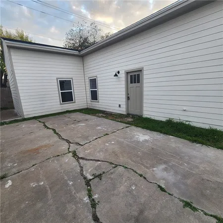 a view of backyard of house