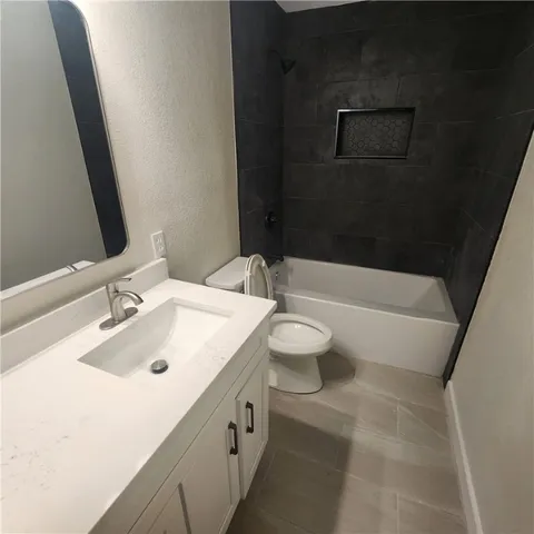 a bathroom with a sink and a bathtub