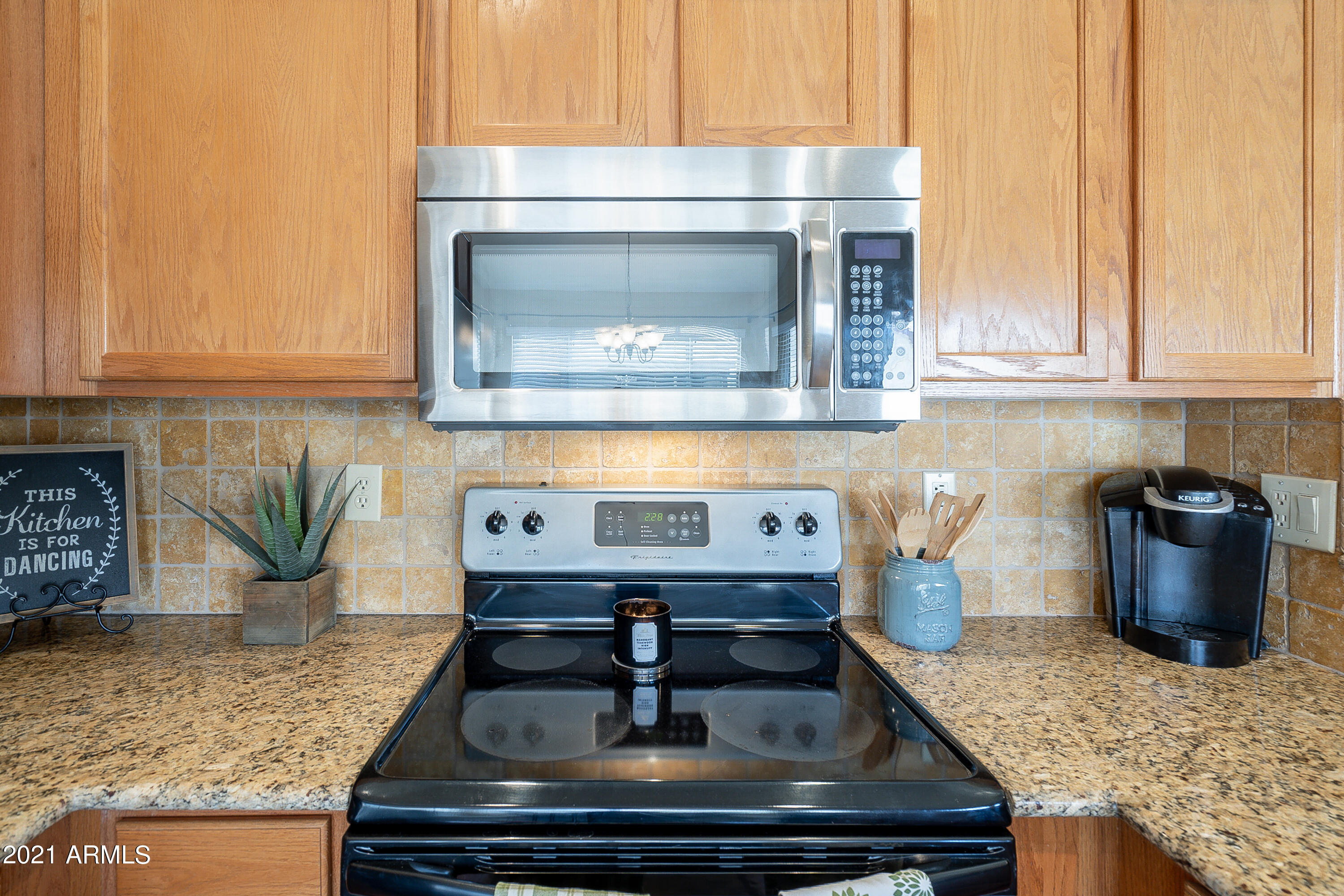 1802 East Peach Tree Drive Chandler, AZ 85249 - Photo 13 of 30 a kitchen with a stove and cabinets