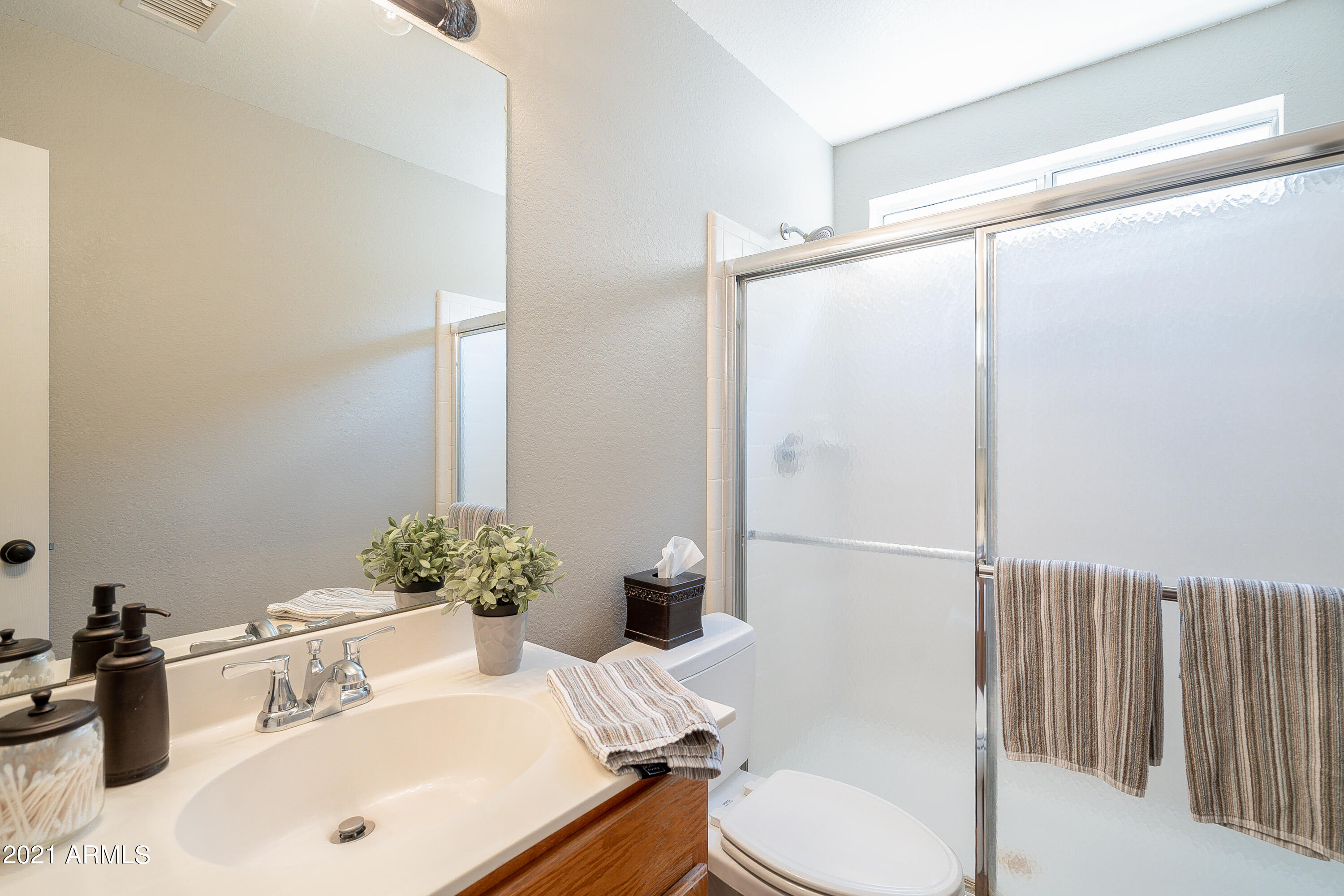 1802 East Peach Tree Drive Chandler, AZ 85249 - Photo 18 of 30 a bathroom with a sink toilet and shower