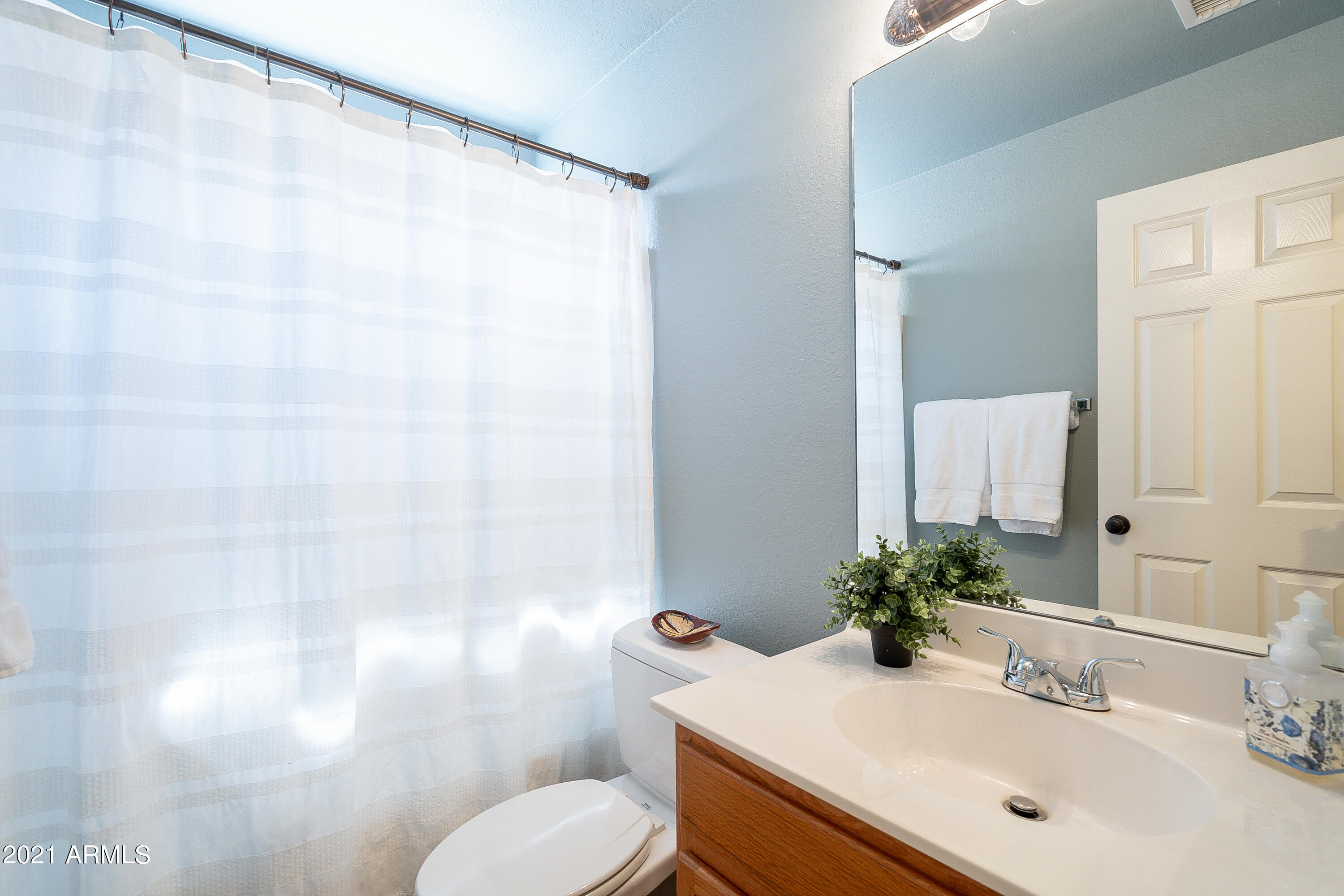 1802 East Peach Tree Drive Chandler, AZ 85249 - Photo 19 of 30 a bathroom with a sink toilet and shower