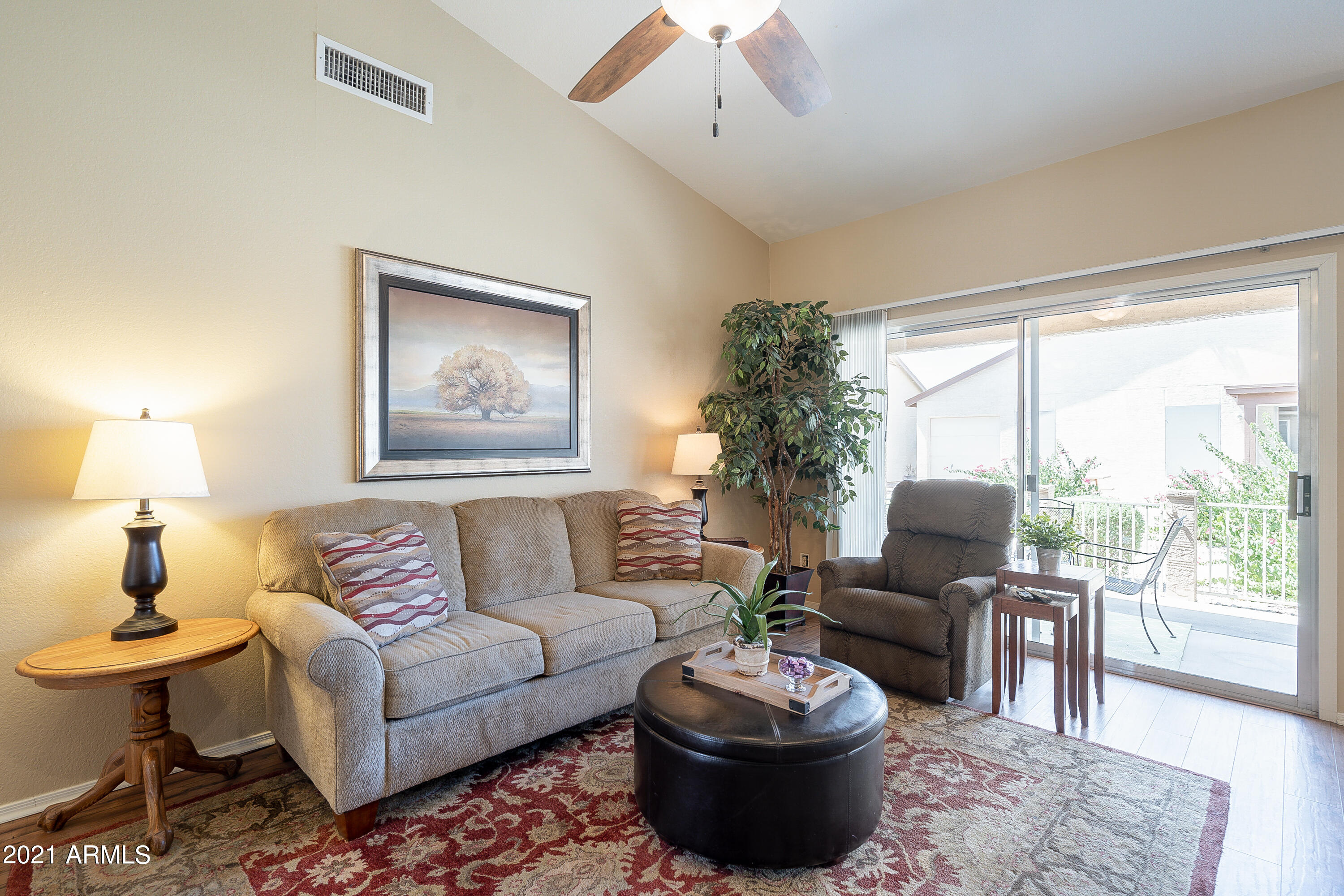1802 East Peach Tree Drive Chandler, AZ 85249 - Photo 2 of 30 a living room with furniture and a large window