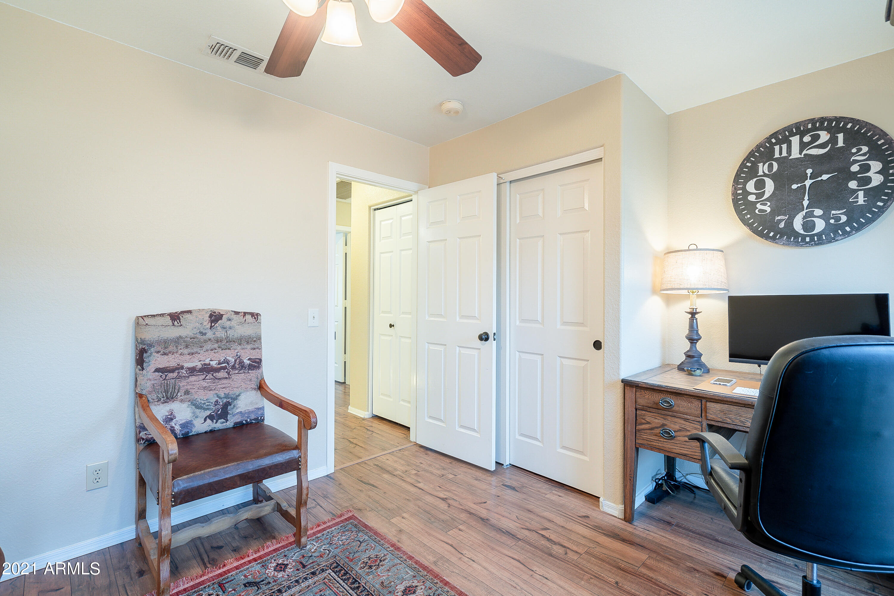 1802 East Peach Tree Drive Chandler, AZ 85249 - Photo 21 of 30 a view of a workspace with furniture and wooden floor