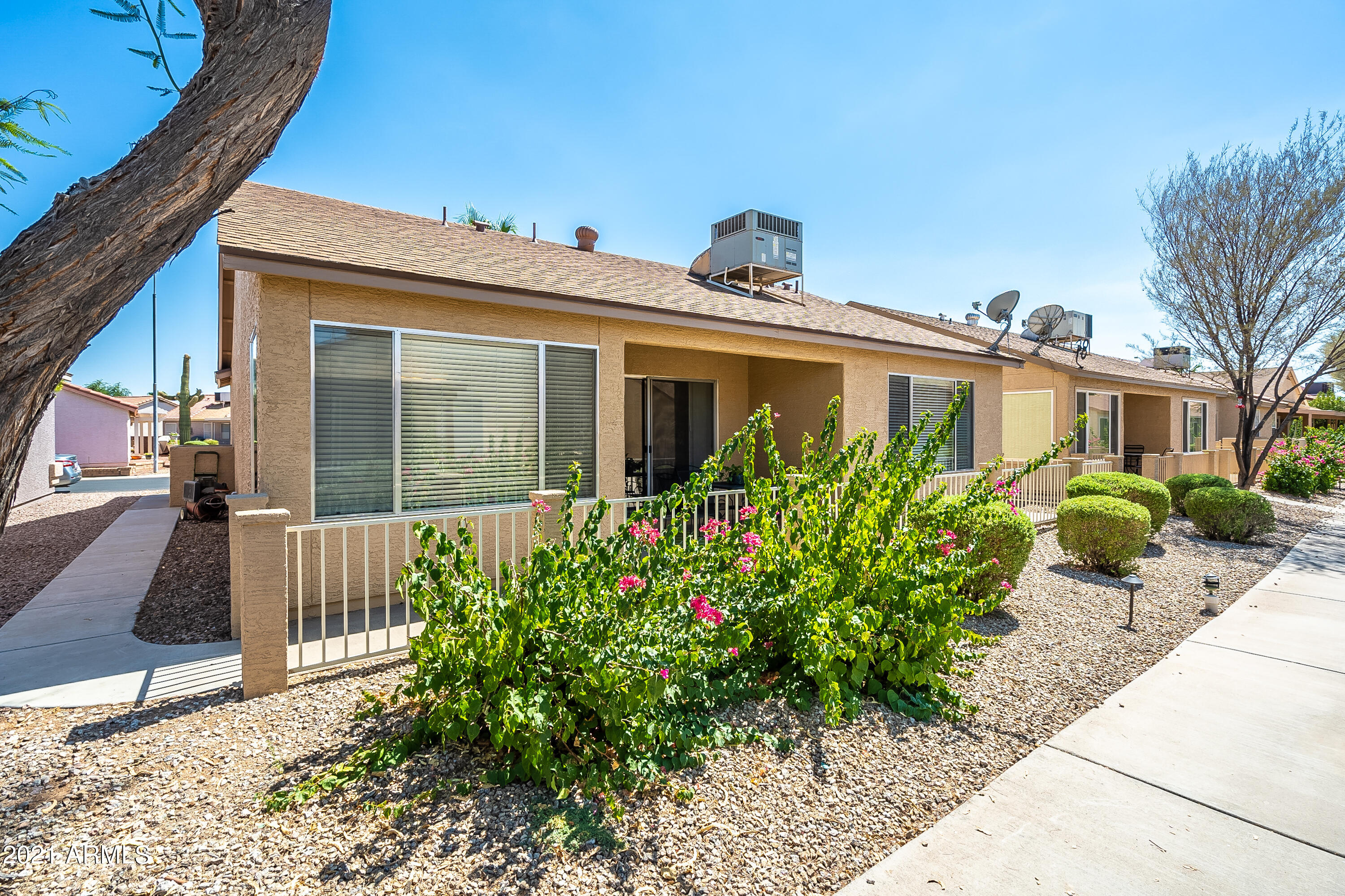 1802 East Peach Tree Drive Chandler, AZ 85249 - Photo 27 of 30 a view of a house with a flower garden