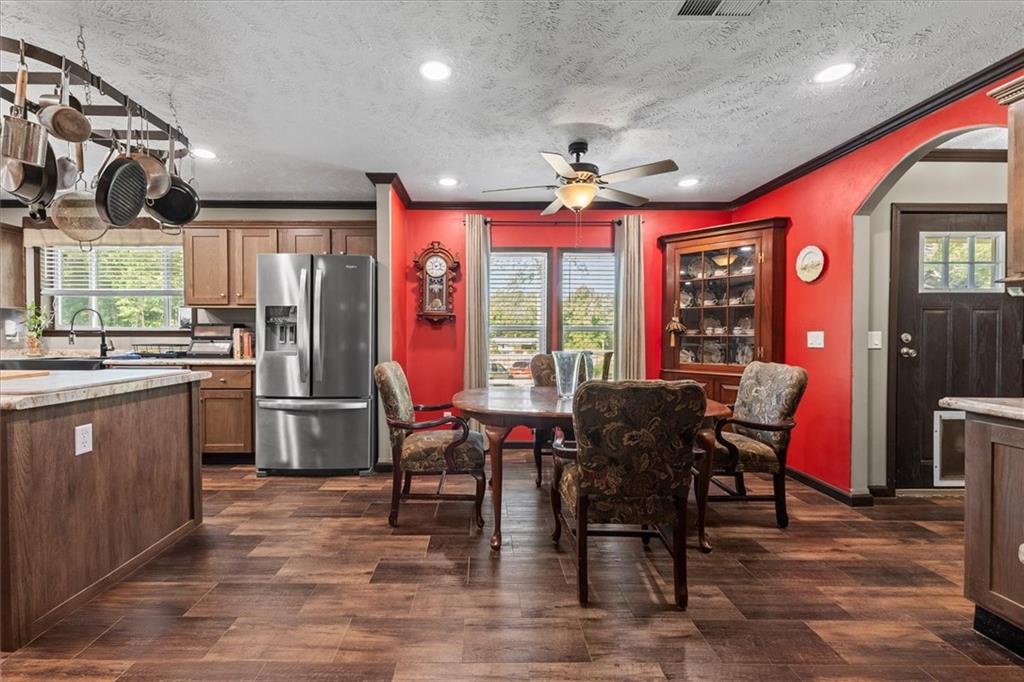 170 Anoia Road Washington, GA 30673 - Photo 6 of 46 a view of a dining room with furniture window and wooden floor