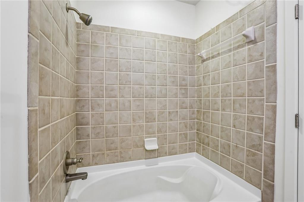 5300 Peachtree Road, Unit 3506 Atlanta, GA 30341 - Photo 14 of 25 a bathroom with a bathtub